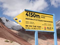08B Sign at Travellers Puteshestvennikov Pass 4133m with distances ahead to camps 1, 2, 3 and the summit on the way to Ak-Sai Travel Lenin Peak Camp 1 4400m